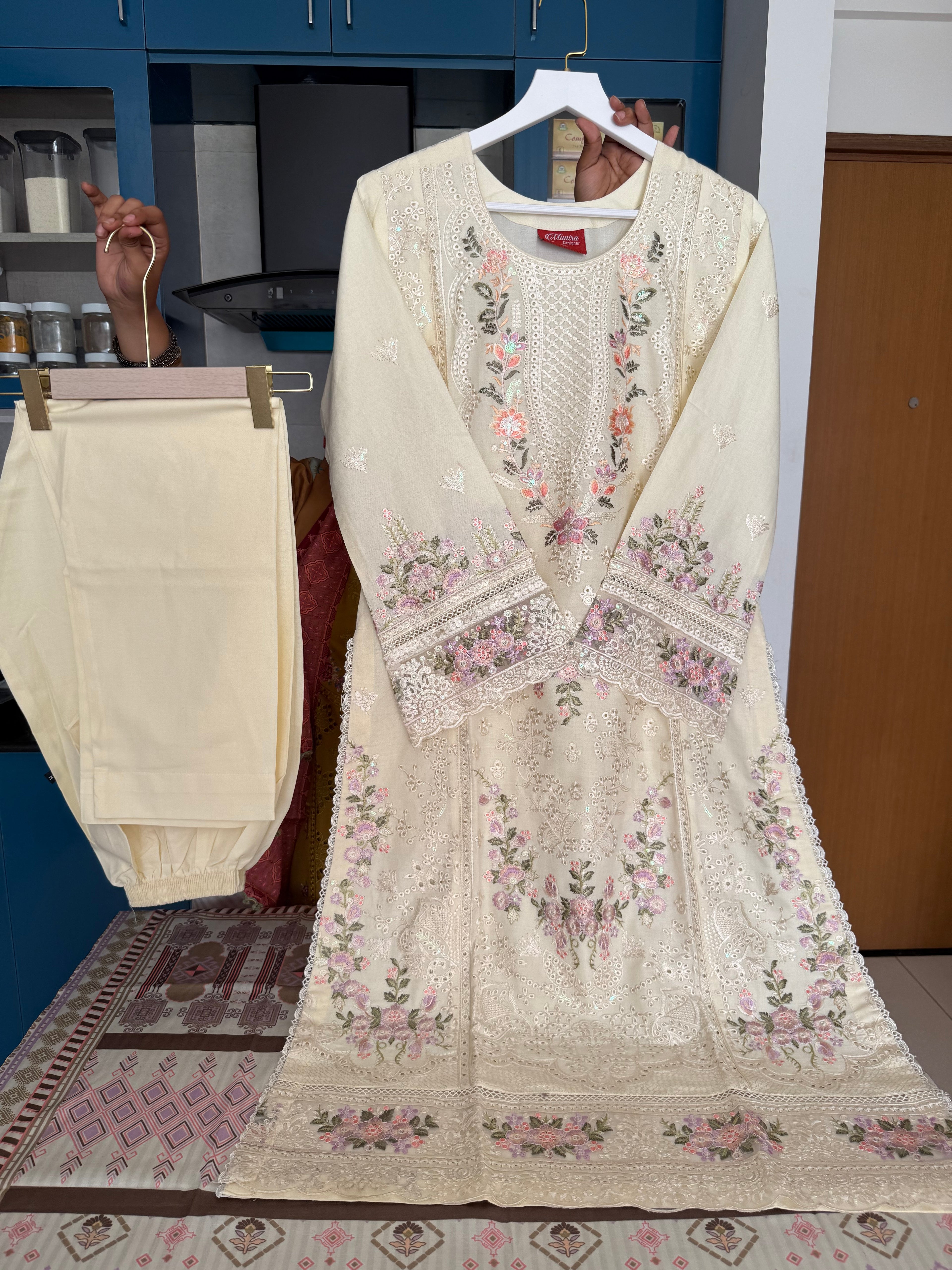 Munira Designer: Pastel-Embroidered Cream Linen Ensemble
