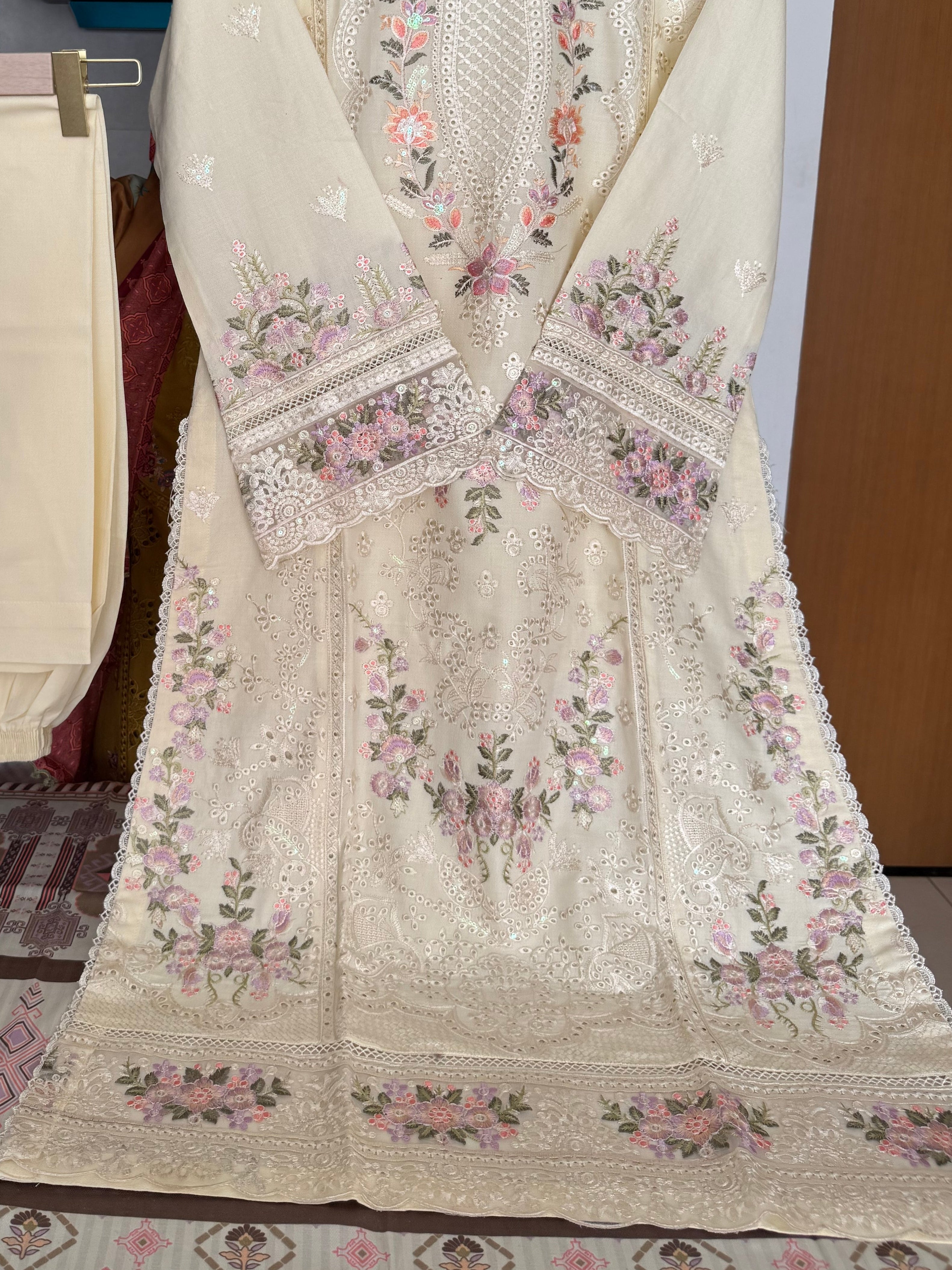 Munira Designer: Pastel-Embroidered Cream Linen Ensemble